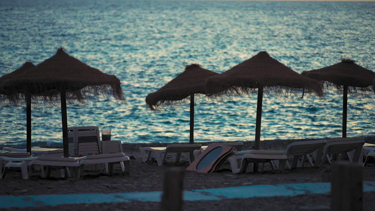 Sunbeds after sundown at the beach