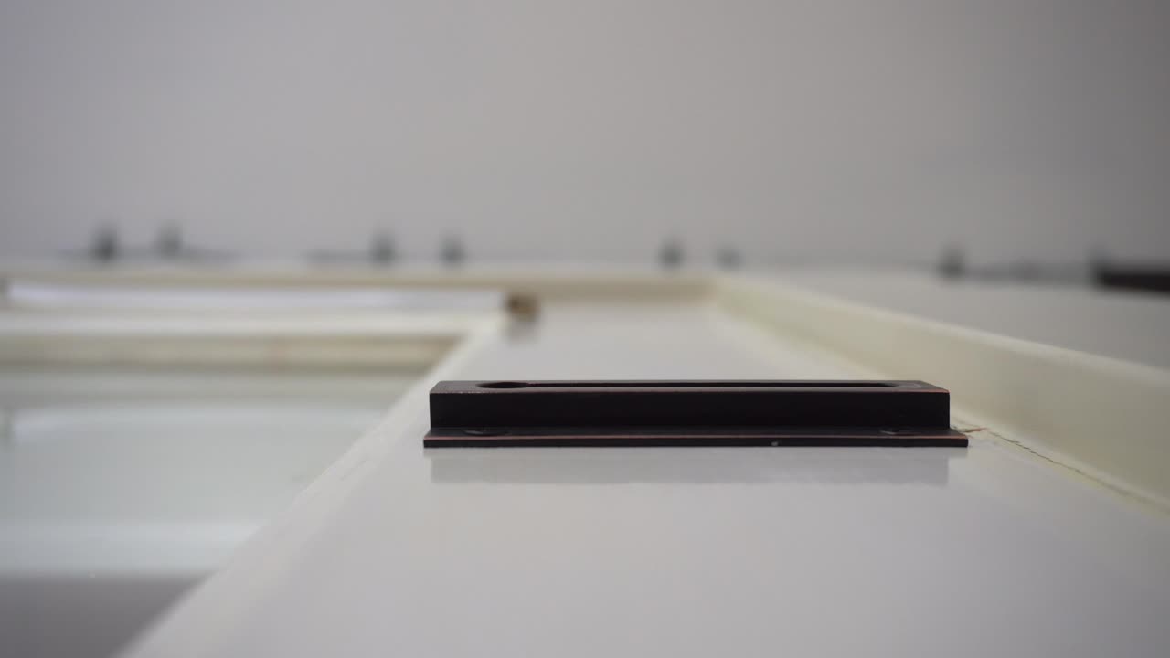 Chain lock on door being locked and unlocked