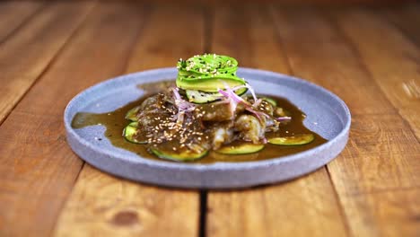 aguachile plate, traditional mexican dish on a wooden table