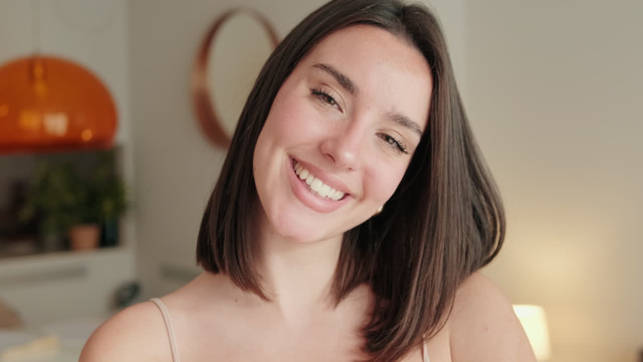 Close up of young European Woman Smiling at Home