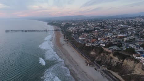 aerial view of coastal town at sunset