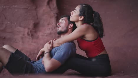 loving couple embracing in canyon