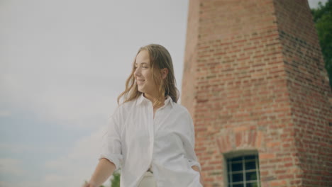 Smiling-Woman-Walking-Outdoors