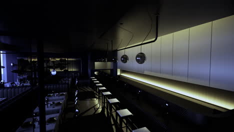modern restaurant interior with unique lighting during evening hours