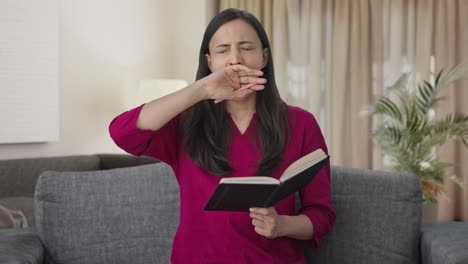 Tired-Indian-woman-writing-a-book