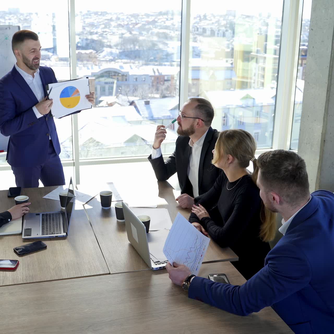 Young colleagues sitting at the business meeting in the office. Brainstorming at the office