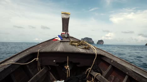 point of view ship moving and the adventure seascape background of the trip journey by tourist boat at krabi in thailand at clear summer day with blue sky