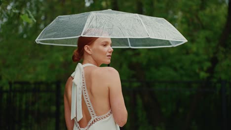 woman with umbrella in the rain