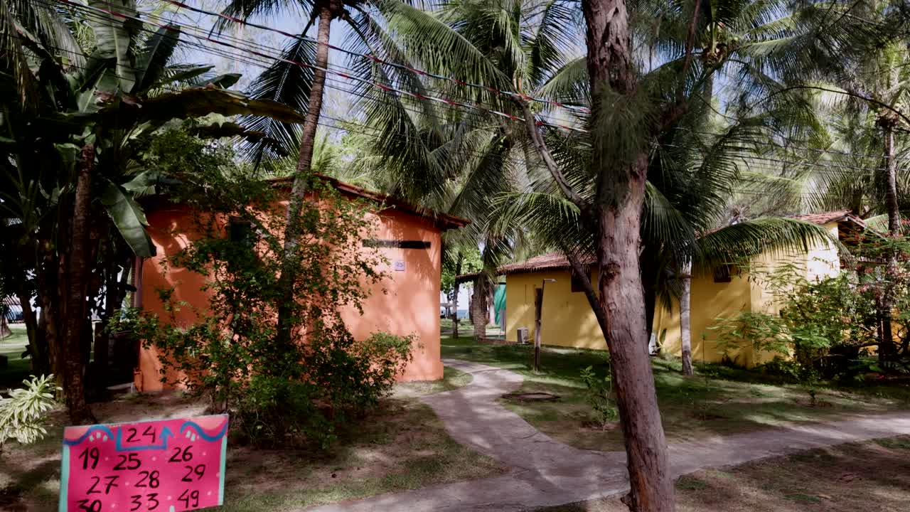 Static shot of Colorful bungalows in Nature Eco-resort, Porto de Galinhas. Brazil