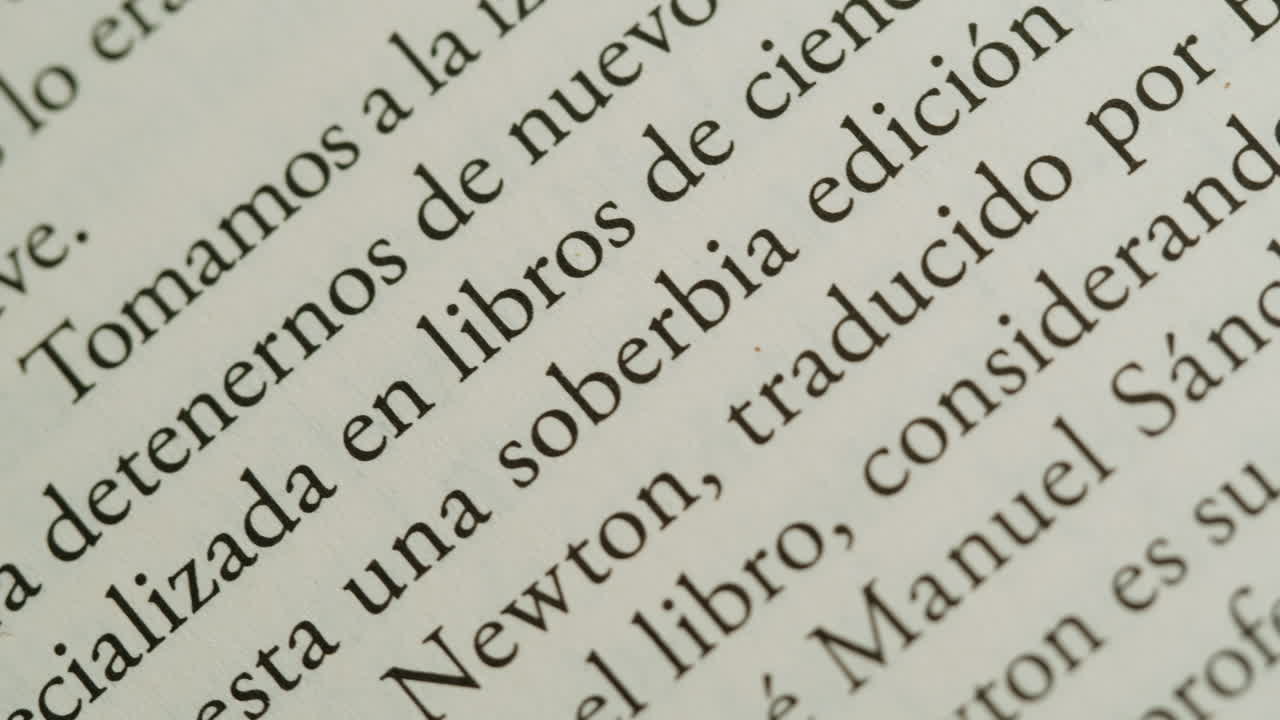 Close-up of a book page with Spanish text