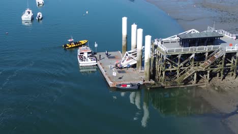 sunny beaumaris pier aerial view relaxing seaside waterfront tourist attraction welsh landmark tracking arriving boat