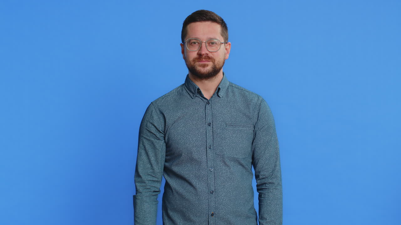 Man presses finger to lips make silence gesture sign do not tells secret stop gossip privacy