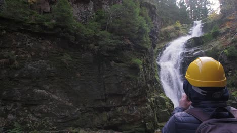 amazing view of cascada del ezaro a beautiful waterfall in a mountainous area in a coruña galicia amazing view of cascada del ezaro a beautiful waterfall in a mountainous area in a coruña galicia spain aerial drone pullback shot slow motion