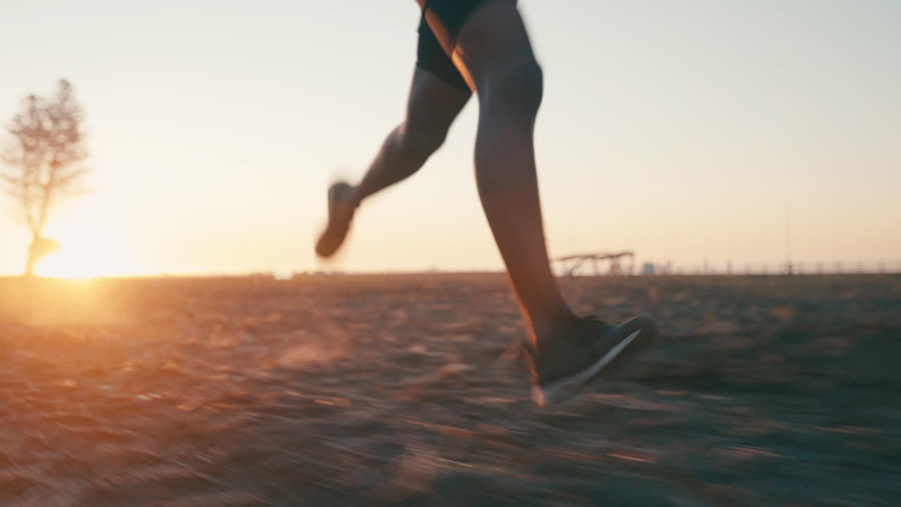 4k video footage of a sporty man running outdoors