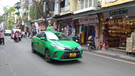 busy street scene in ho chi minh city, vietnam