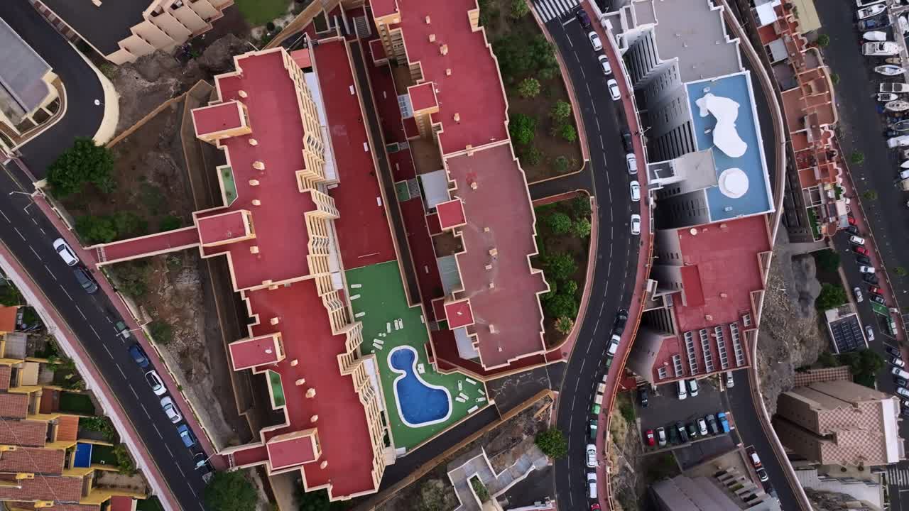 Bird’s-eye perspective of Radazul architecture with vivid rooftops, pool below