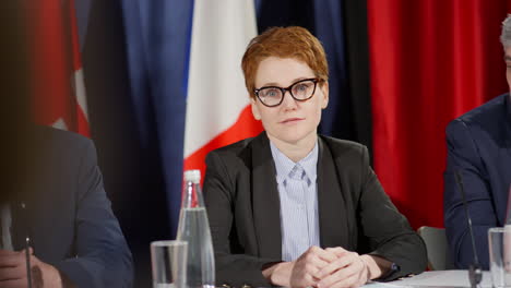 female political leader talking at press conference