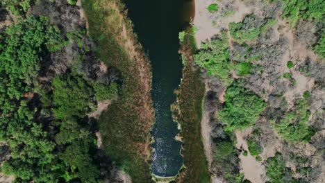 Aerial-shot-of-a-lake-in-the-middle-of-the-Pacasmayo-desert