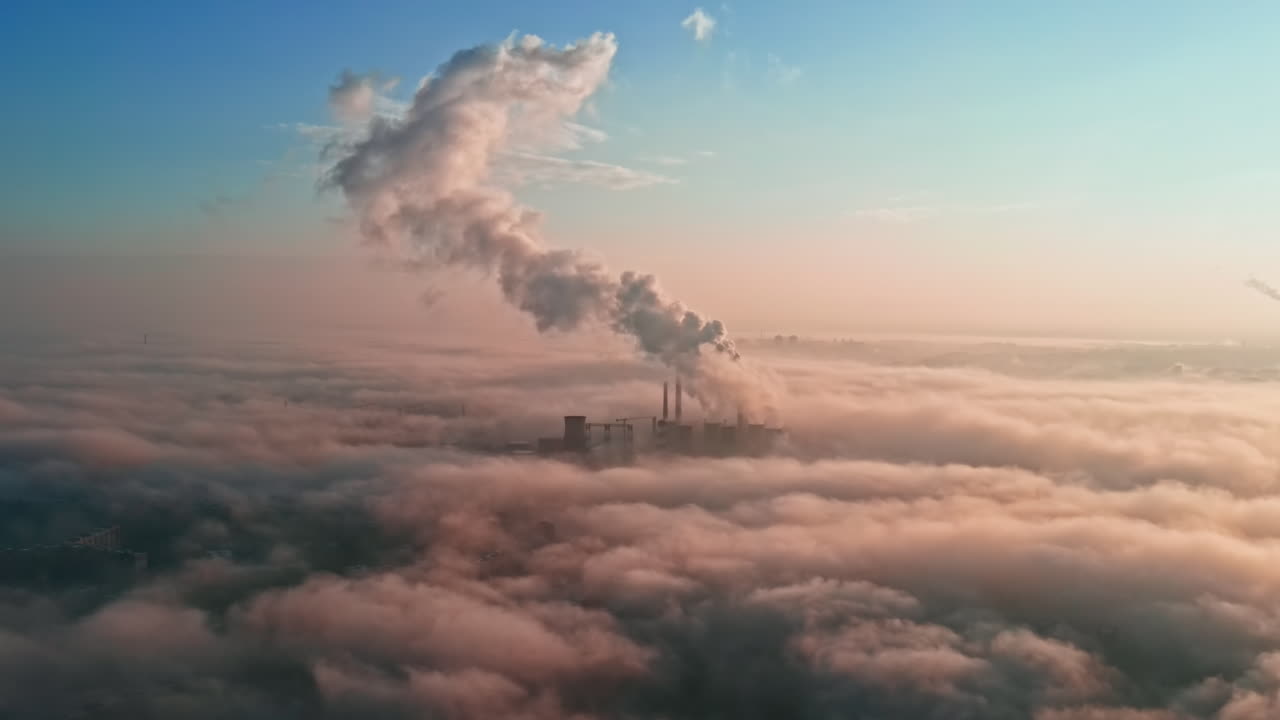 Cityscape of Bucharest from a drone, rows of residential buildings, thermal station with fog getting out and other the ground, ecology idea, Romania