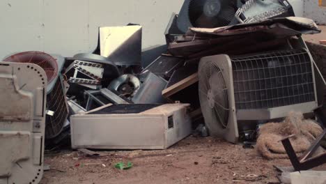 Air-conditioner-units-broken-and-busted-left-outside-to-rust-after-heatwave-swept-the-nation-and-world-during-climate-change-and-wildfire-crisis