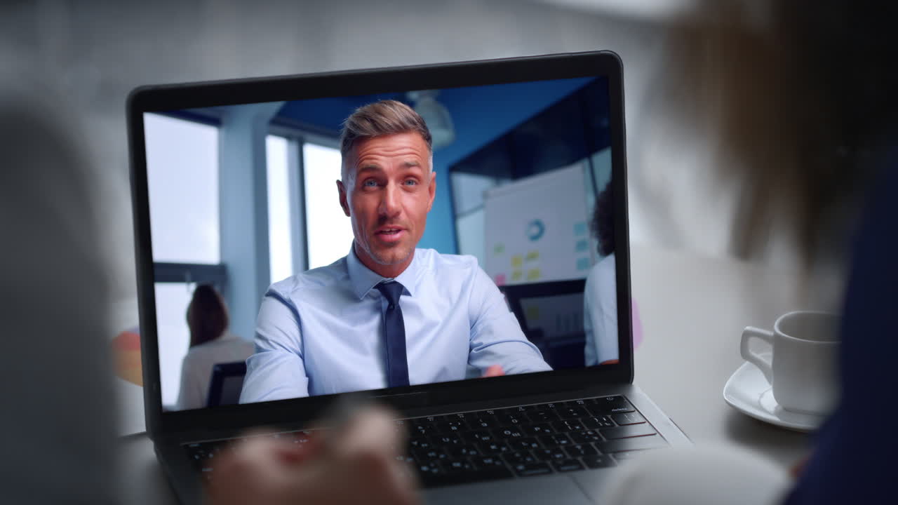 Business manager consulting online by video connection close up. Couple talking