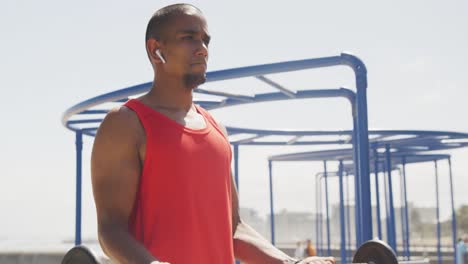 side view man with prosthetic leg exercising