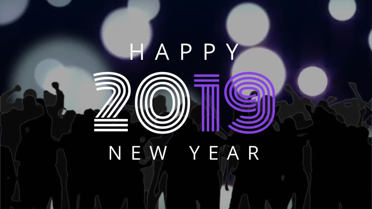 Silhouette of people dancing against 2019 New Year Sign 4k
