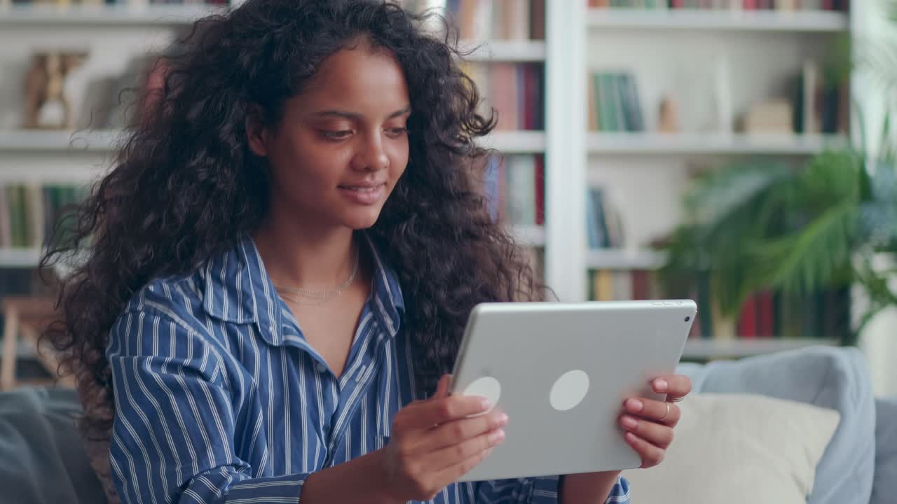Hindu teen female chat in conference app on tablet begin conversation