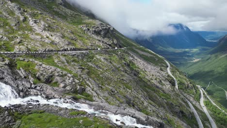 trollstigen mountain pass, norway - scenic route and famous tourist attraction in andelsnes, romsdalen valley - pan right