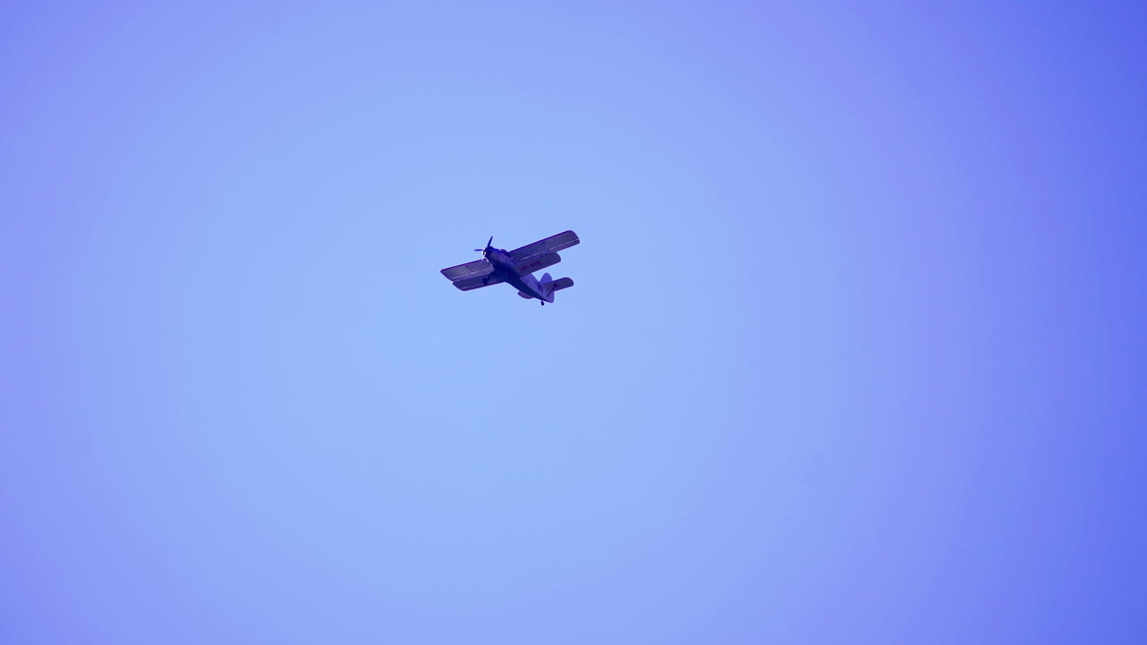 Small Biplane in the Sky