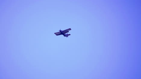 small biplane in the sky