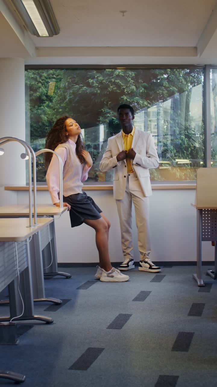 Two people standing in a room