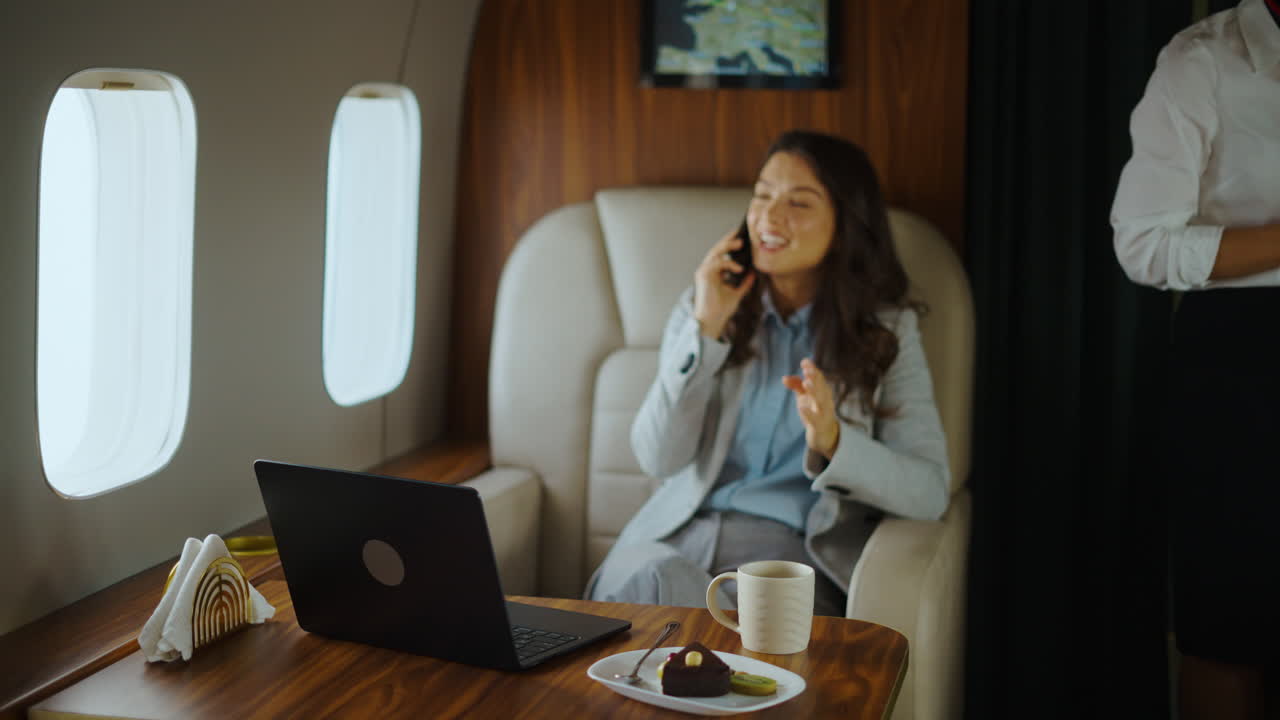 Business woman on a private jet