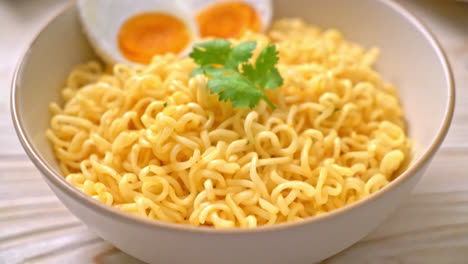 instant noodles bowl with salt egg