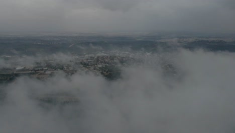 Wonderful-panorama-of-clouds-view-from-above-of-the-green-countryside-Israel,-Katzir