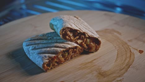 Homemade-mexican-tortillas-on-a-wooden-board,-slight-zoom-in