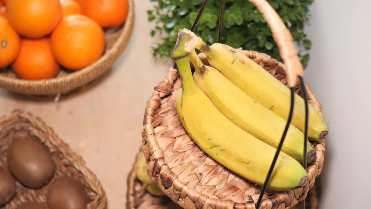 Bananas and Oranges in Baskets