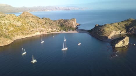 Sailboat-Nautical-Adventure-on-Mexico-Coastline-in-Agua-Verde-Cove---Aerial-Establishing-Drone-View