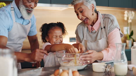family baking together in the kitchen