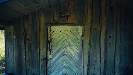 wooden rural cabin with closed door in norway