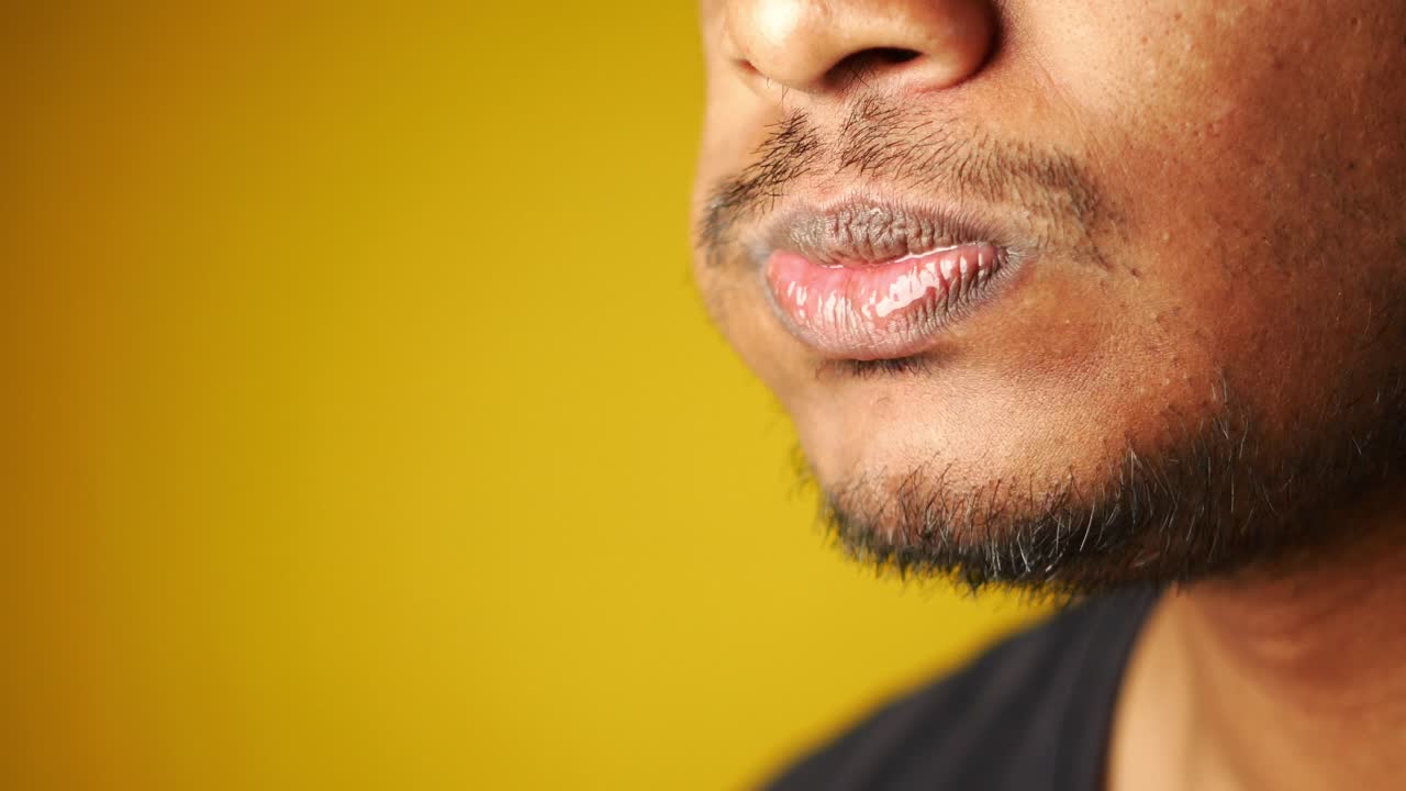 Man with a beard and open mouth