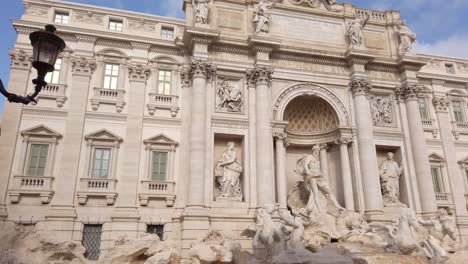 view of trevi fountain in the historical center of rome