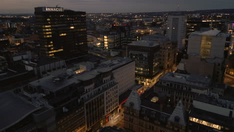 establishing drone shot over leeds city centre at night