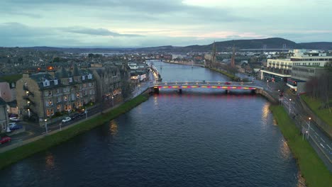 aerial panoramic view of city at dusk