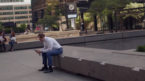 man resting during a lunch break, business man having a lunch break, keeping up with stock crypto market