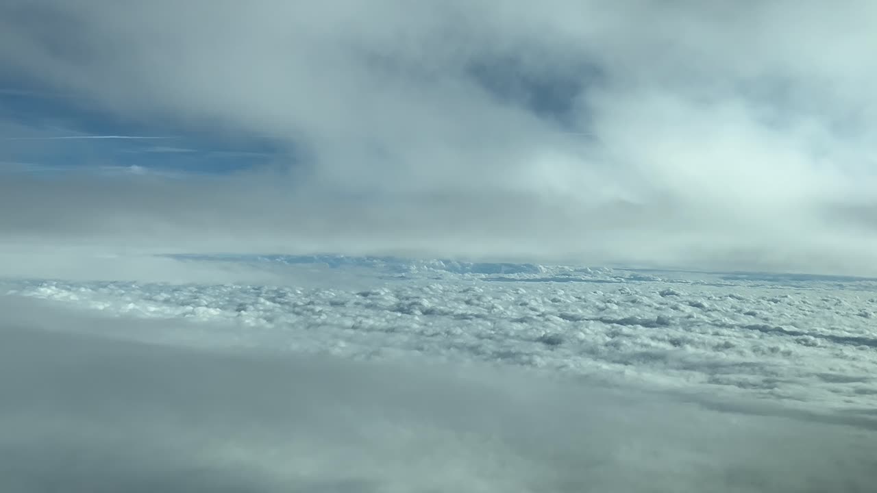 Cloudscene flying through a serene sky with some fluffy clouds, a pilot&rsquo;s point of view