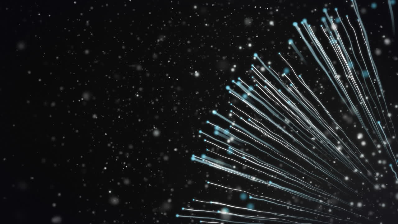 Animation of explosion of light trails over spots of lights in background