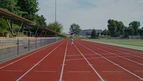 woman running on a track