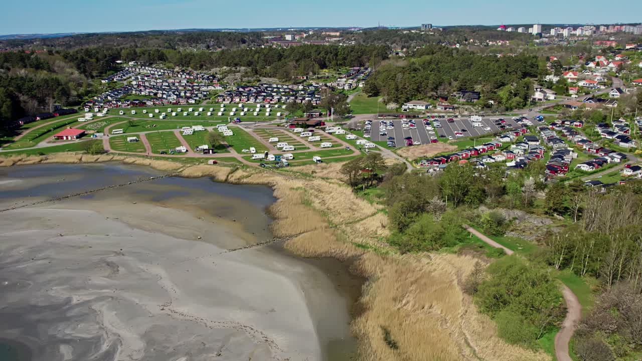 Beach and parking lot by Askimsbadet, Gothenburg, Sweden, aerial view