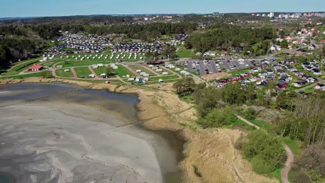 Beach and parking lot by Askimsbadet, Gothenburg, Sweden, aerial view
